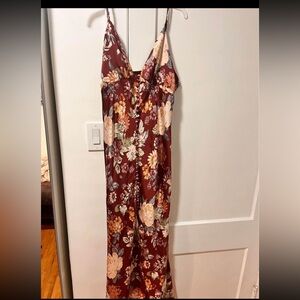 Satin floral dress with button details and a sexy slit!
